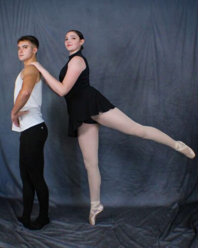 male and female ballet dancers posed